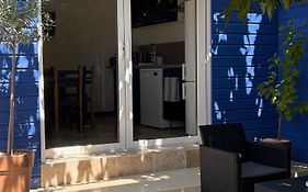 Maison Gekko, climatisée avec patio, places de parking privées, plage à 800m